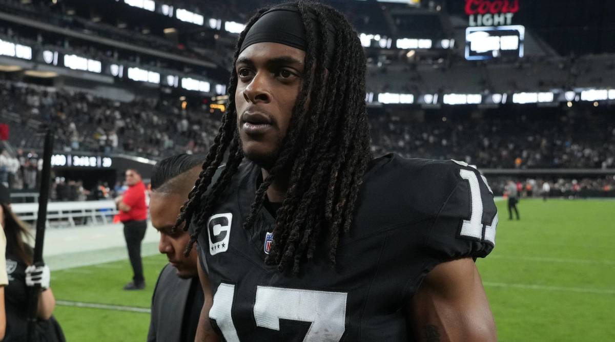 Raiders receiver Davante Adams walks off the field after a game.
